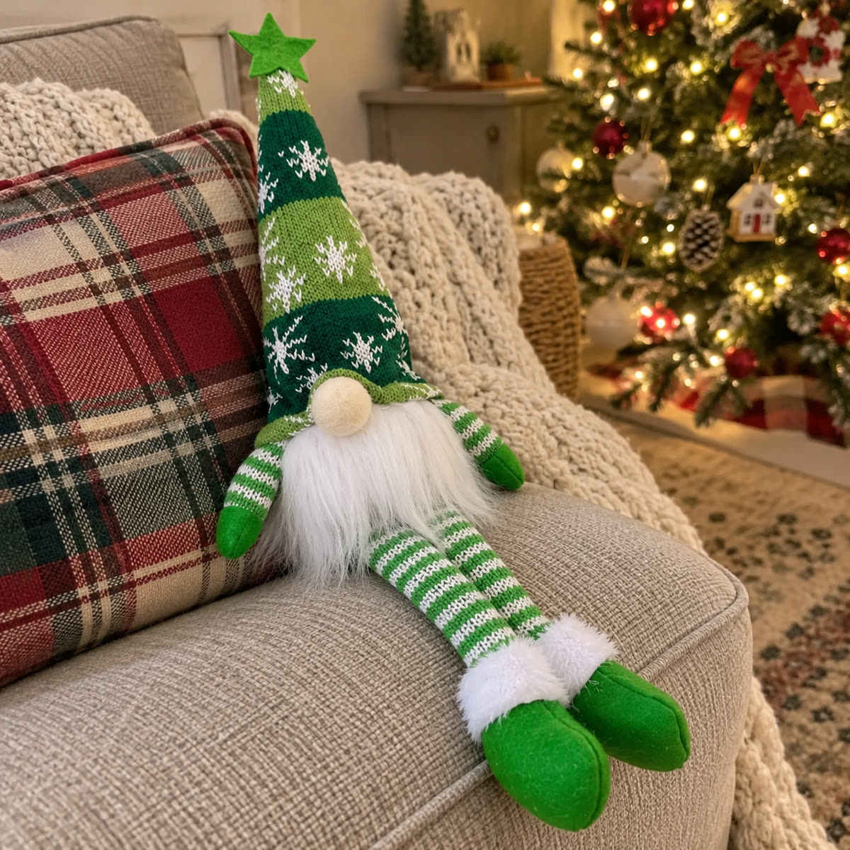 Customer photo of green Christmas doll on a sofa